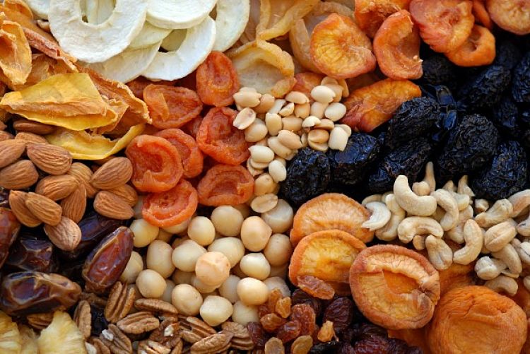 Dried fruit and nuts are high energy and high carbohydrate- food but their GI is relatively low and they fill you up, so they are a good snack food when eaten sparingly